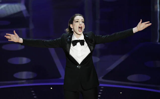 Co-host Hathaway sings during the 83rd Academy Awards in Hollywood